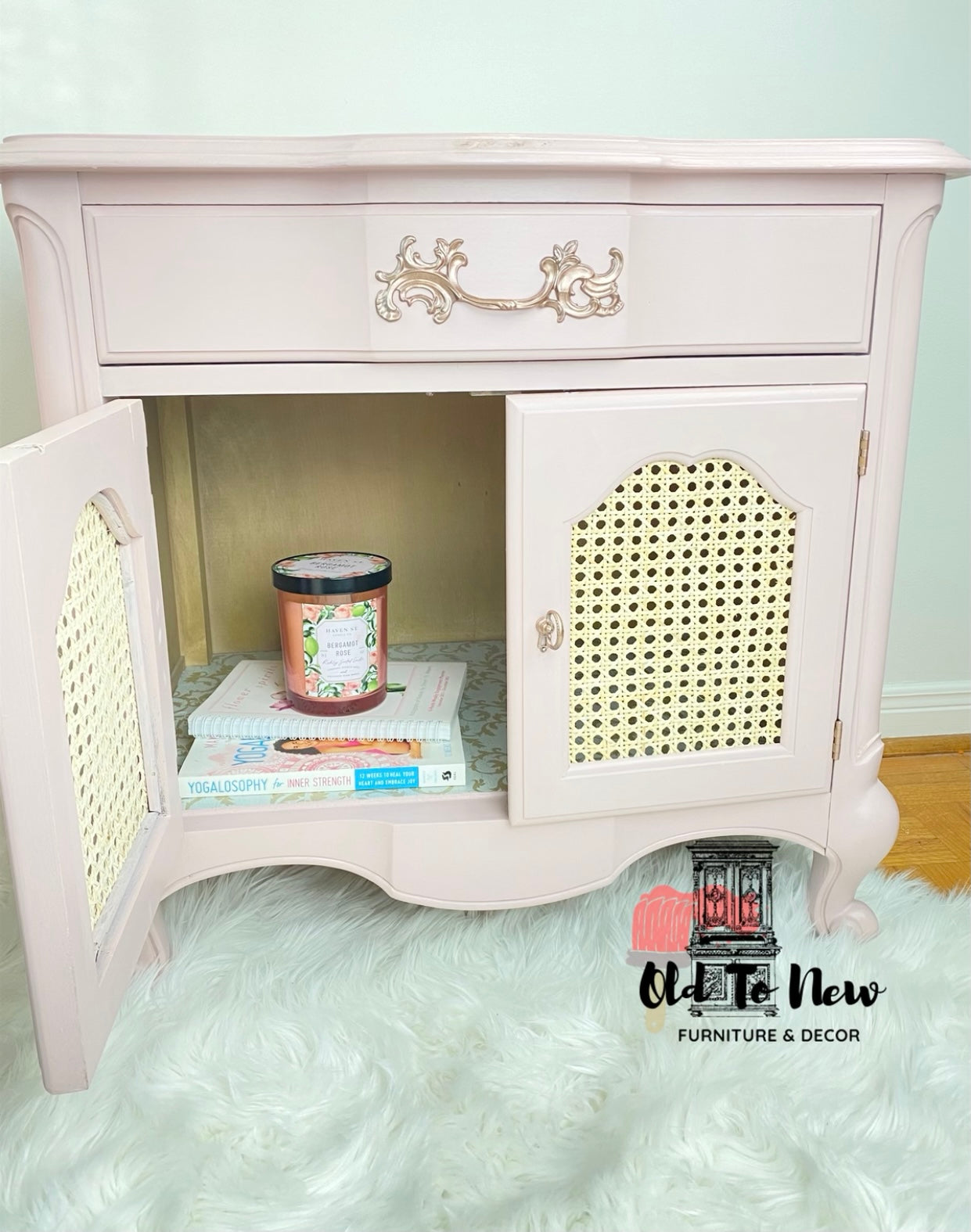 Pink French Provincial End Table with candle and books inside the lower compartment,  painted by Old To New Furniture in Toronto Ontario