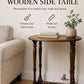 Customizable wooden Eastlake Style side table in a living room setting with a neutral color scheme.