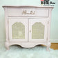Blush pink end table with a what shah carpet French Country Shabby Chic decor