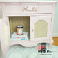 Pink French Provincial End Table with candle and books inside the lower compartment,  painted by Old To New Furniture in Toronto Ontario 