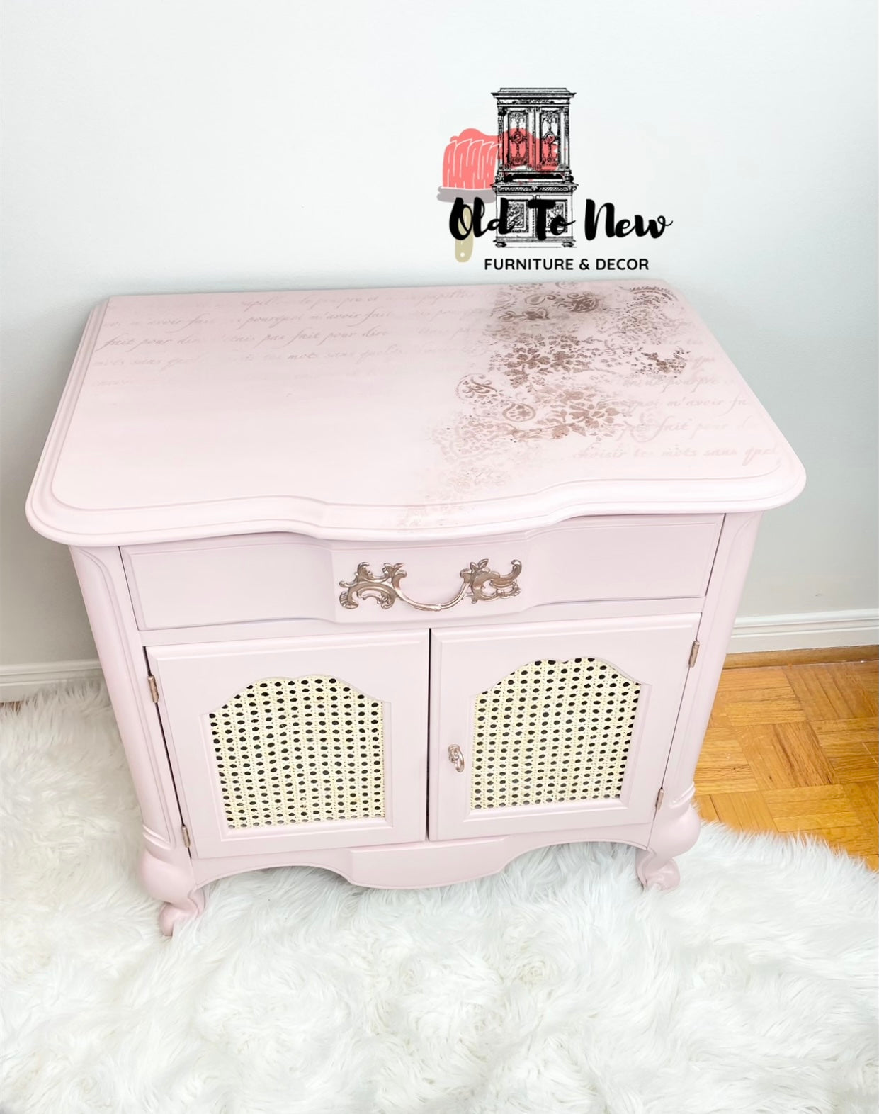 Top View of French Provincial Side Table painted  pink at Old To New Furniture  copper accents and rattan cane DIY material  door insert