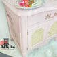 Pink Side Table with  hot Pink orchid and rattan cane door  insert  Painted a soft pink